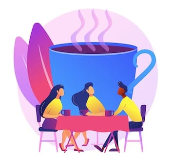 3 adultes discutent en langue étrangère autour d'un café